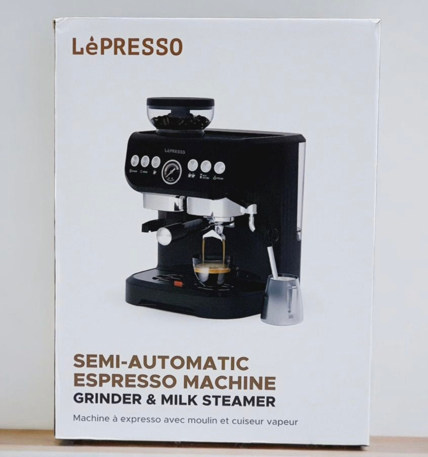 LePresso professional coffee maker grinds coffee beans and steams milk